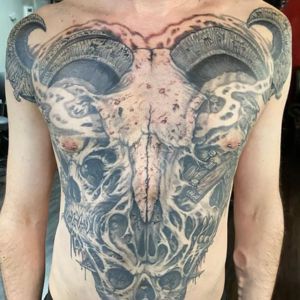 chest dark surrealism tattoo