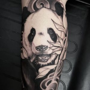 black and gray panda tattoo