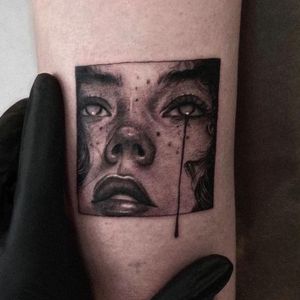 dark teardrop tattoo 