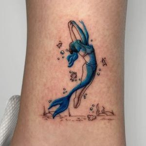 minimal color mermaid tattoo