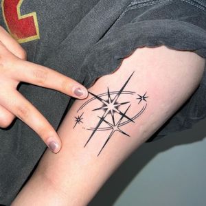arm sparkle tattoo