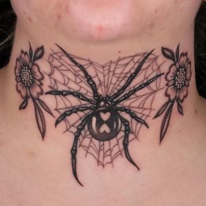 neck spider face tattoo