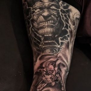 black and gray darkseid tattoo