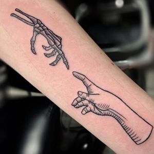 hand connection tattoo