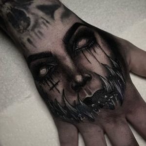 hand succubus tattoo