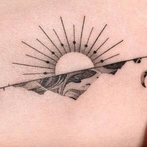 minimal sun tattoo