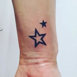 simple hand star tattoo