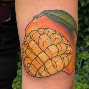 sliced mango tattoo