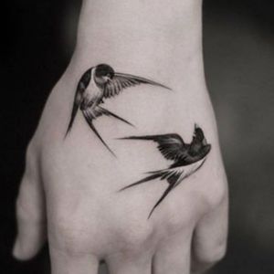 sparrow and swallow tattoo