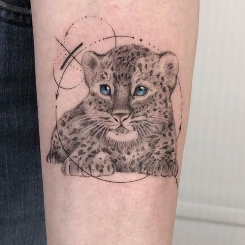 best baby snow leopard tattoo