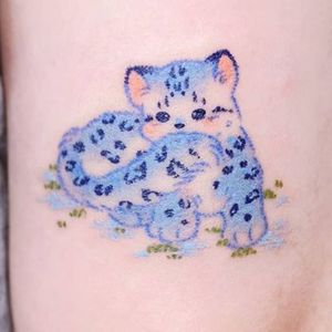 cute baby snow leopard tattoo