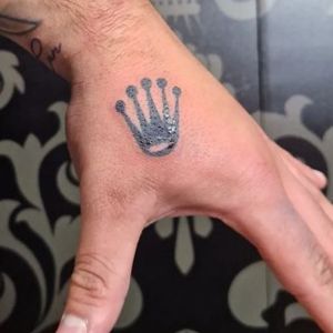 finger Rolex tattoo for men
