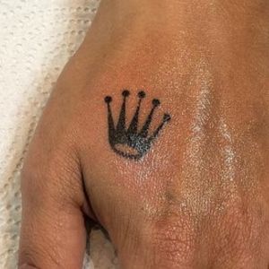 hand Rolex tattoo for women