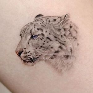 minimal snow leopard tattoo