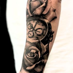 rose and Rolex tattoo