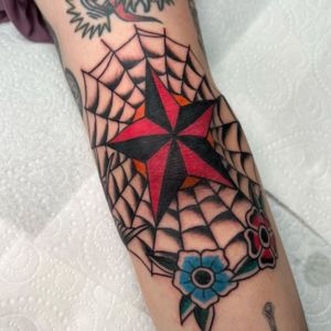 star and web tattoo