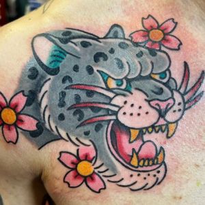 traditional snow leopard tattoo face