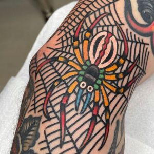 traditional spider web tattoo elbow meaning