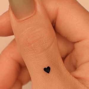 thumb women tattoo