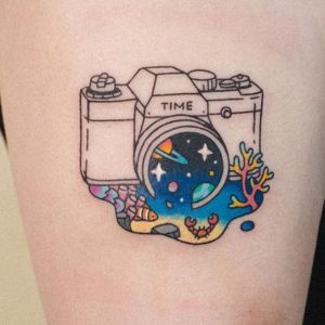 camera galaxy watercolor tattoo using a tattoo gun as a beginner