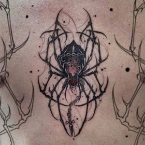 chest hunter hunter spider tattoo