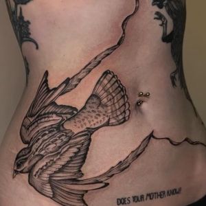 bird tummy tuck tattoo